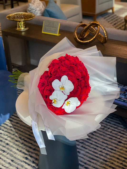 Long stem roses and orchids