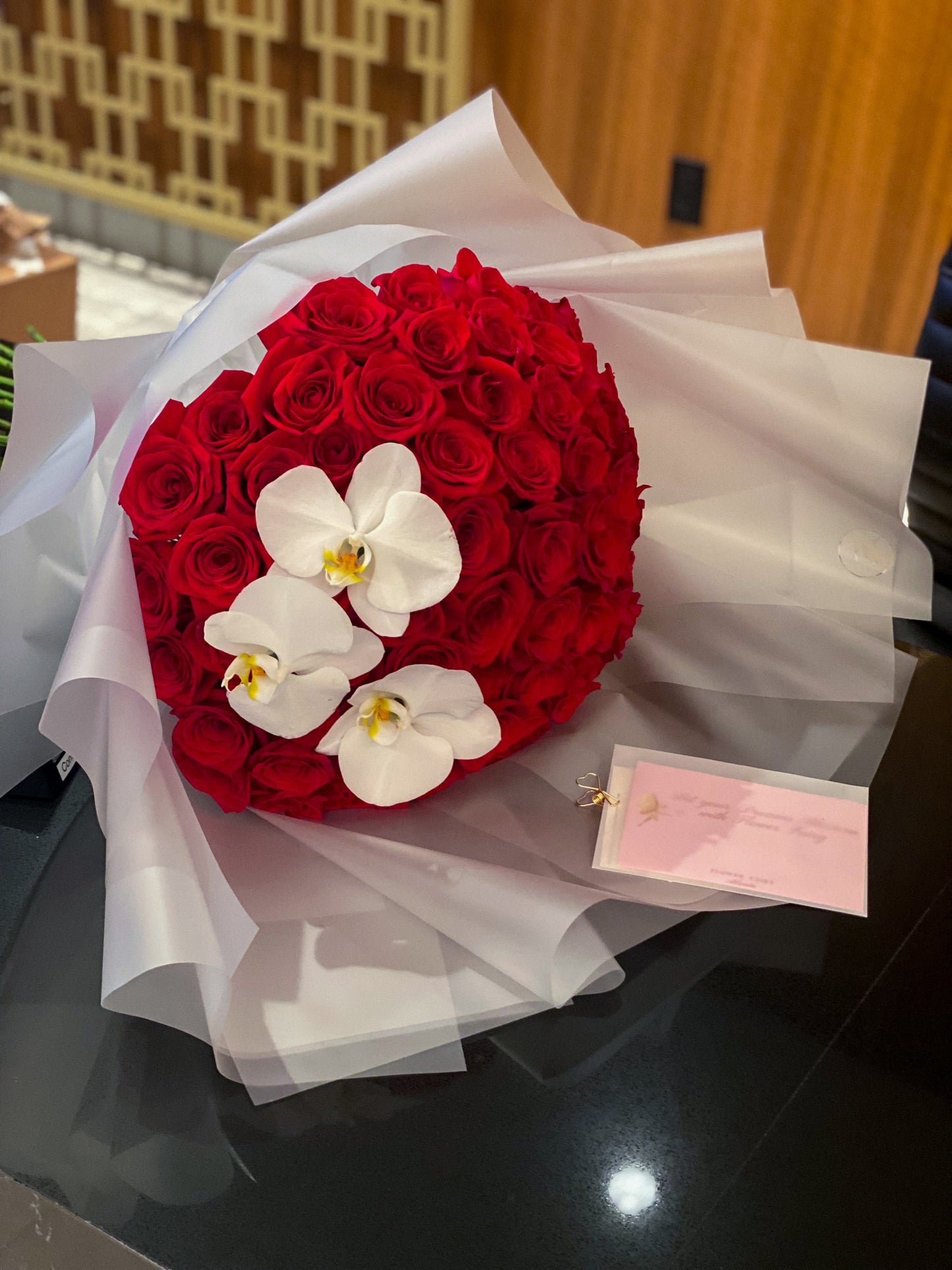 Long stem roses and orchids