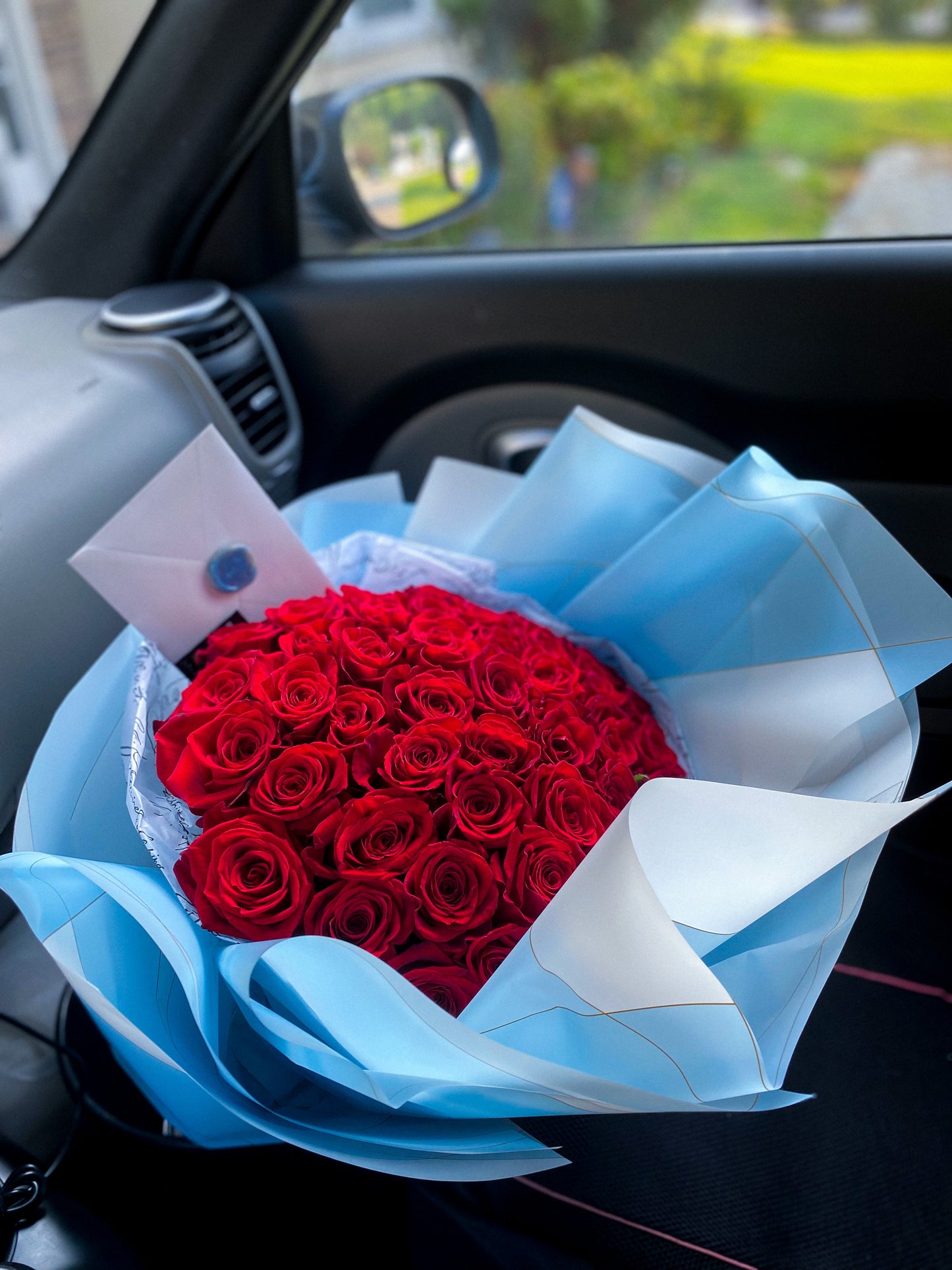 50 red long stems roses