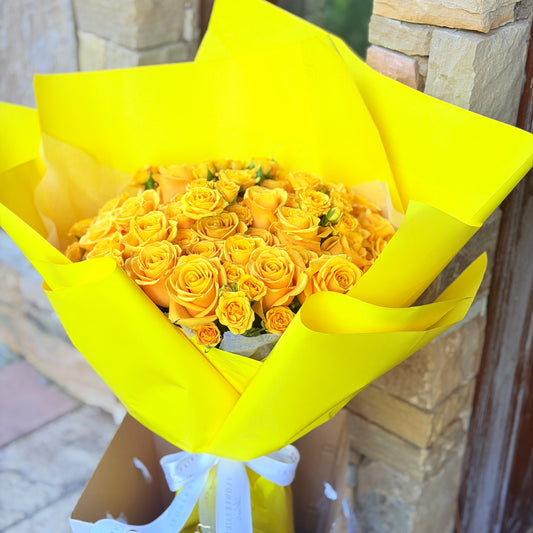 50 long stem yellow roses plus spray roses (florist choice)