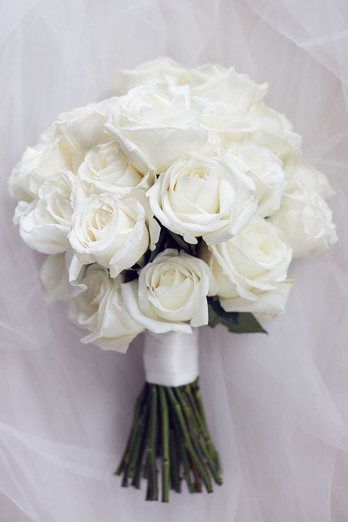 Bridesmaids bouquet each bouquet to contain 25 white roses